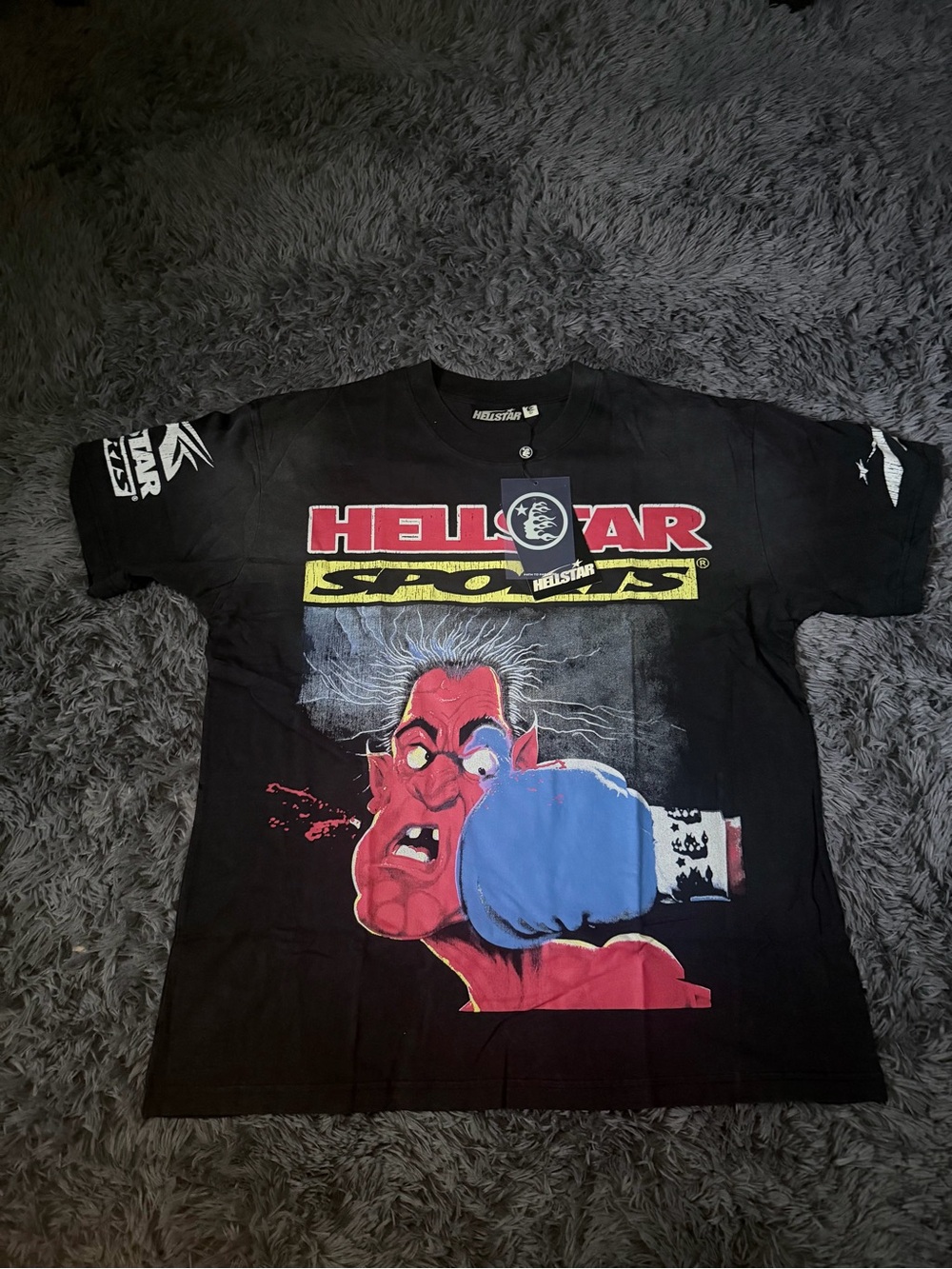 Hellstar Men’s Black Graphic Tee with Blue Glove Artwork